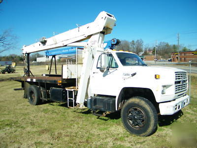 1989 FORDF800 flatbed with NATIONAL556 boom truck crane