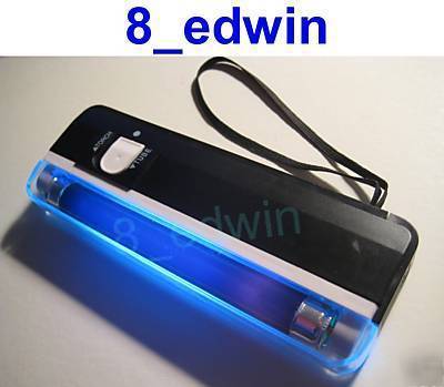 A portable 4W black ( uv ray ) tube light 09B