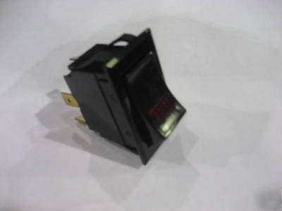 Lighted rocker carling switch