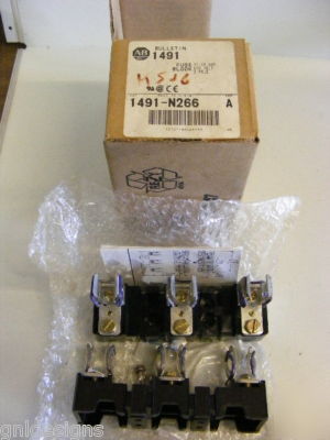 New 9 piece lot & used allen bradley fuse blocks 