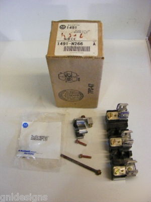 New 9 piece lot & used allen bradley fuse blocks 