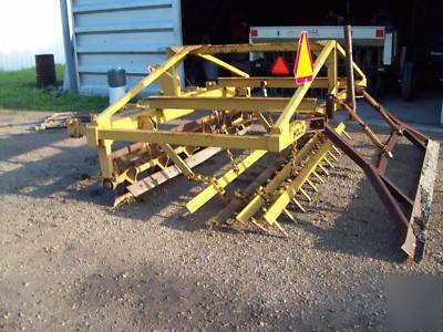 9' holly 7 shank soil conditioner, harrow, leveler.