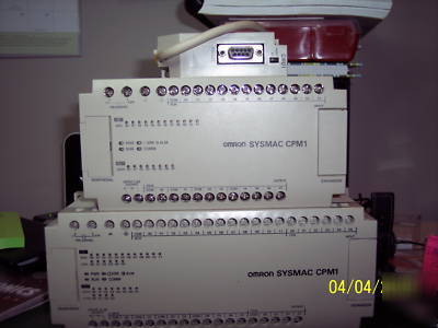 (2) omron CPM1...and a RS232C link