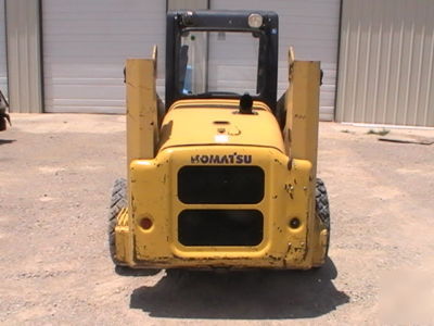 2003 komatsu SK815 skid steer loader