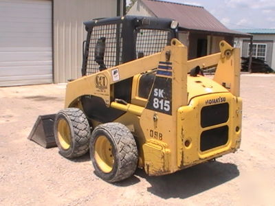 2003 komatsu SK815 skid steer loader