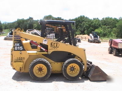 2003 komatsu SK815 skid steer loader