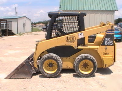 2003 komatsu SK815 skid steer loader