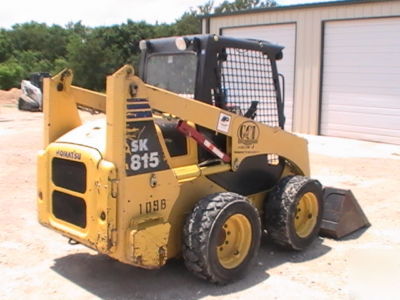 2003 komatsu SK815 skid steer loader