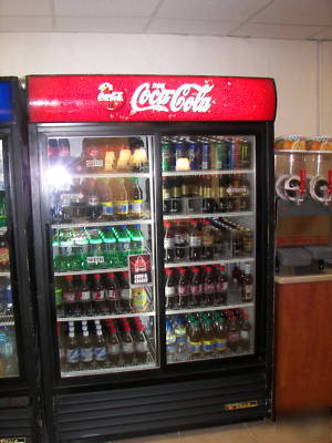 3 true two door coolers with logo pepsi, coke, and 7-up