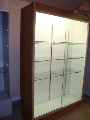 Display case-four glass shelves-sliding glass doors
