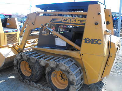 2001 case 1845C skid steer tire machine w/steel tracks