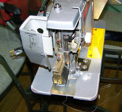 National 126 single pull binding brute carpet machine