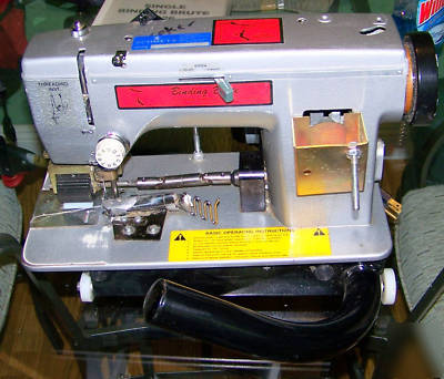 National 126 single pull binding brute carpet machine