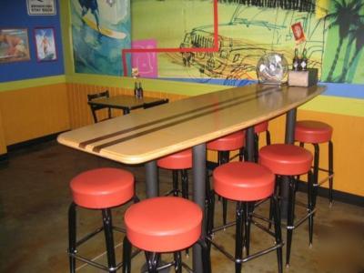 Barely used surf board dining table w/ 8 barstools 
