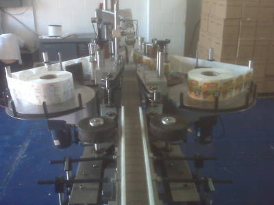 Labeler - front & back labeler with top hold down belt