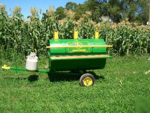 Pig roaster john deere edition super bbq trailer steaks