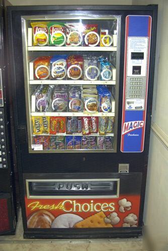 Snack vending machine w/ coinco dollar validator