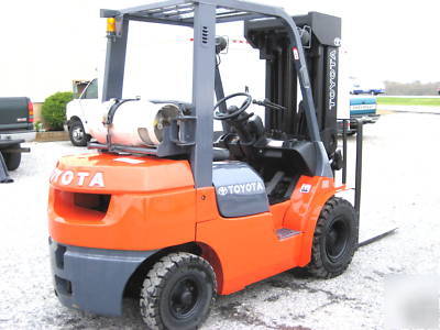 Toyota 5,000# pneumatic forklift, dual fuel, quad mast 