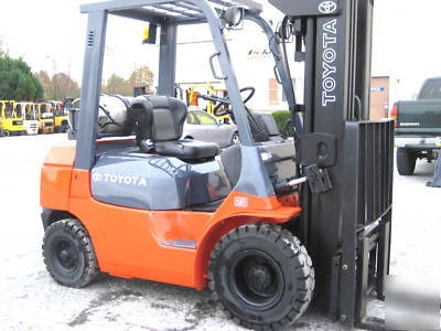 Toyota 5,000# pneumatic forklift, dual fuel, quad mast 