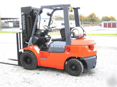 Toyota 5,000# pneumatic forklift, dual fuel, quad mast 