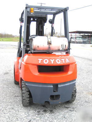 Toyota 5,000# pneumatic forklift, dual fuel, quad mast 