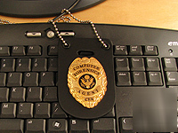 Certified systems engineer gold badge with badge holder