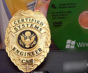 Certified systems engineer gold badge with badge holder