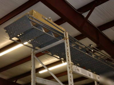 Tri arc safety rolling ladder 15 steps