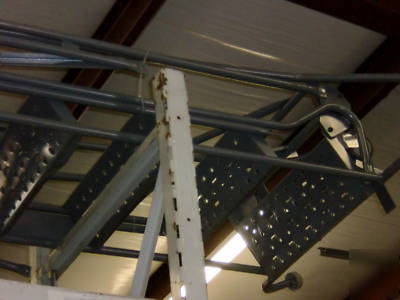 Tri arc safety rolling ladder 15 steps