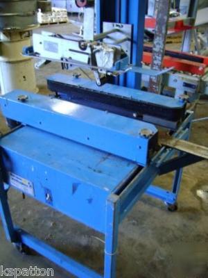 Durable case taper / box sealer with powered belts
