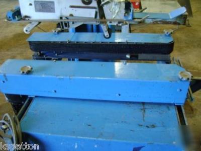 Durable case taper / box sealer with powered belts