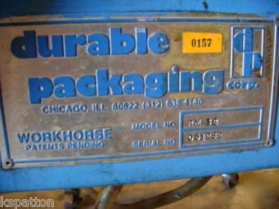 Durable case taper / box sealer with powered belts