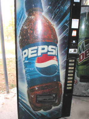 Dixie narco 600E multi-price soda vending machine..