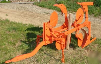 Antique iron allis chalmers two row two way plow