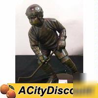 Restaurant waiting area decor hockey player statue