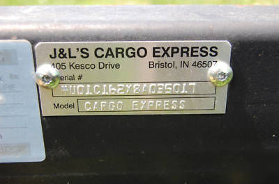 Seamless gutter machine with enclosed trailer