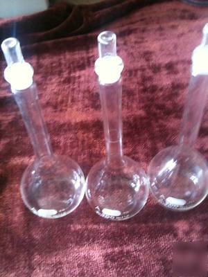 Two 200 ml volumetric flasks class a w/ glass stoppers