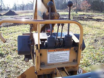1998 case 560 trencher backhoe 4X4 six way blade 