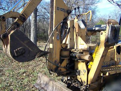 1998 case 560 trencher backhoe 4X4 six way blade 