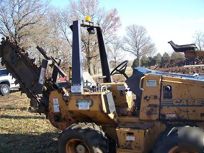 1998 case 560 trencher backhoe 4X4 six way blade 
