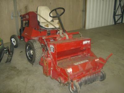 Toro 327 groundsmaster/broom/grass seeder/parts machine