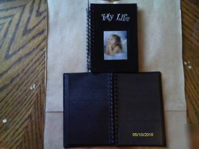1 blank notebook with black paper