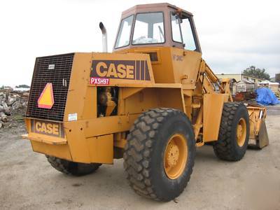 Case W24C wheel loader, 4-in-1 bucket 