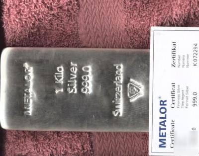 1KG silver bullion bar oz with this land plot purchased