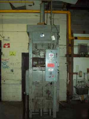 Nichols vertical baler 60