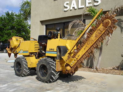 2005 vermeer LM42 trencher / plow combo