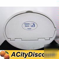 Used plastic oval fold out baby changing station/ table