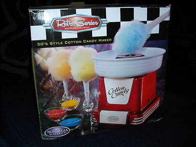 Cotton candy machine with two containers of floss
