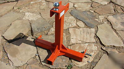 Orange tractor gooseneck trailer and receiver hitch 