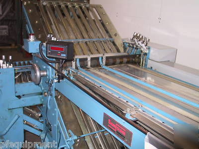 Baumfolder with pile feeder and right angle folder